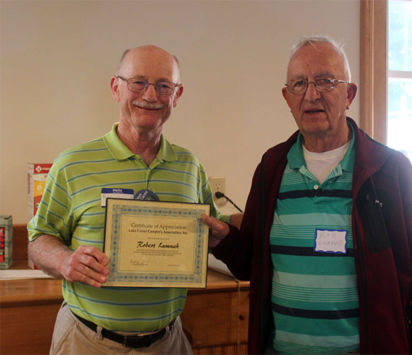 President Beneven thanks & honors director Robert Lumnah - Larry Myott Photo